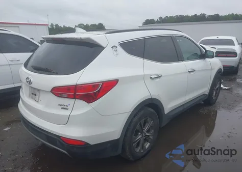 2014 Hyundai Santa Fe Sport 2.4L z USA, uszkodzony, nr VIN 5XYZUDLB7EG219362